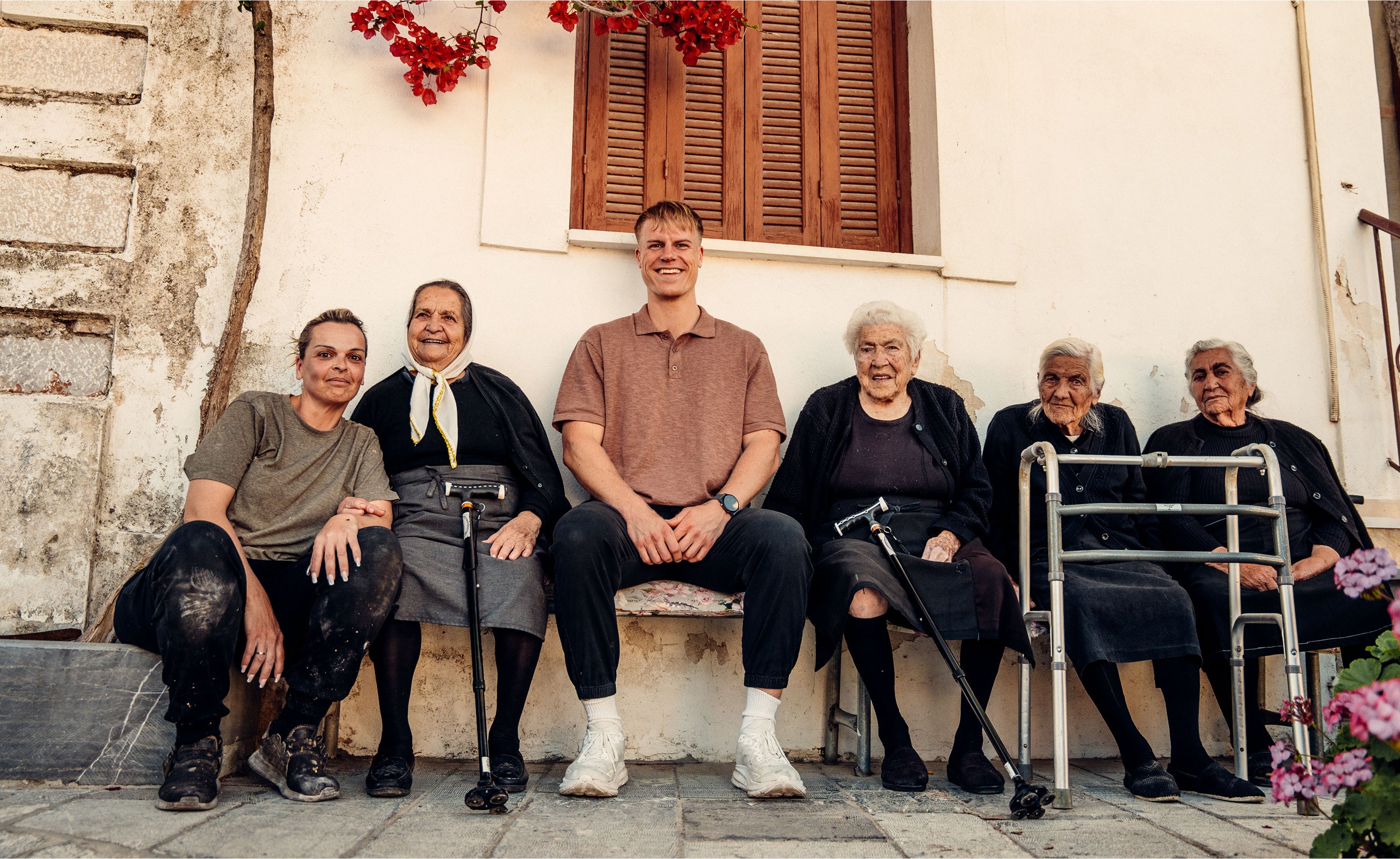 A group of older Greek women laughing together on Chios