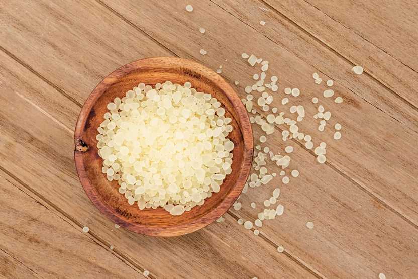 Photo of Greco Gum's mastic droplets in a wooden bowl