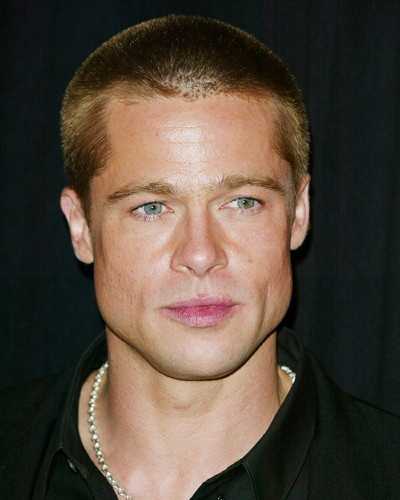 Photo of Brad Pitt attending the premiere of the film Troy